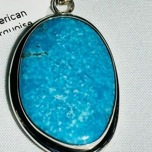 925 Sterling Silver and genuine Turquoise pendant.